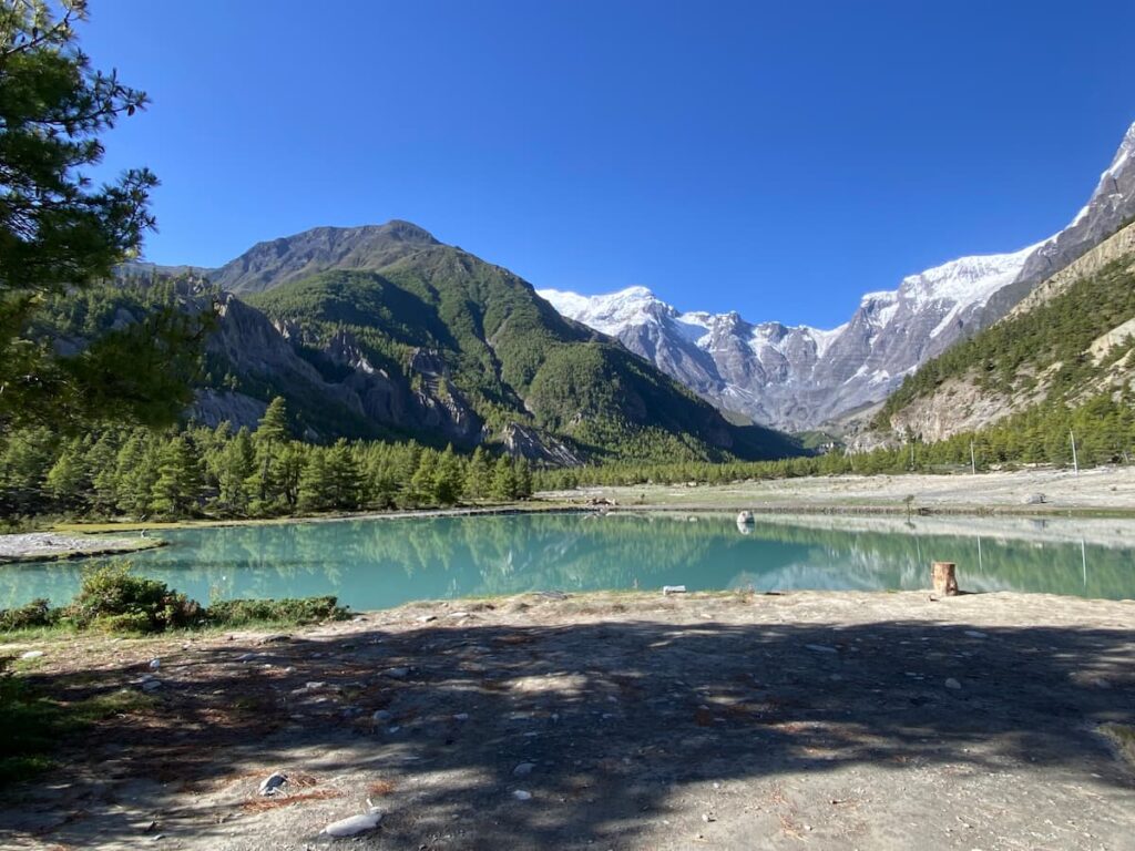 Turquoise glacial lake at Manang during Annapurna Circuit Nepal trekking tour
