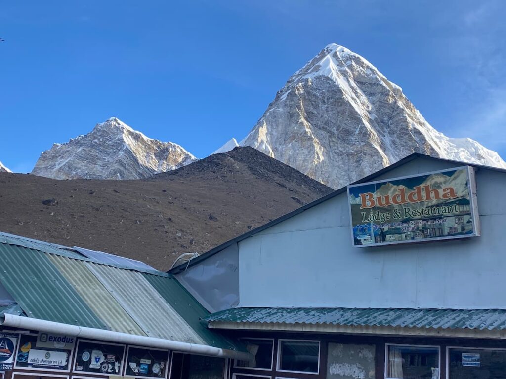 Buddha Lodge tea house at Gorak Shep on the Khumbu Trek Nepal route with Pumori peak towering above