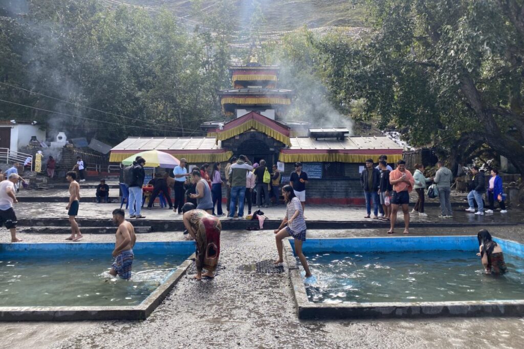 Ancient Buddhist chorten and prayer flags in Kagbeni village — gateway to Upper Mustang on the Annapurna Circuit Trek. Pilgrims at the sacred Muktinath Temple Trek destination at 3,760m — a highlight of the Annapurna Circuit in Nepal