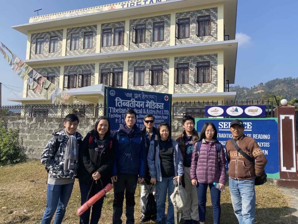 Tour guests visiting the Tibetan Medical and Astro Centre in Pokhara on a cultural day tour