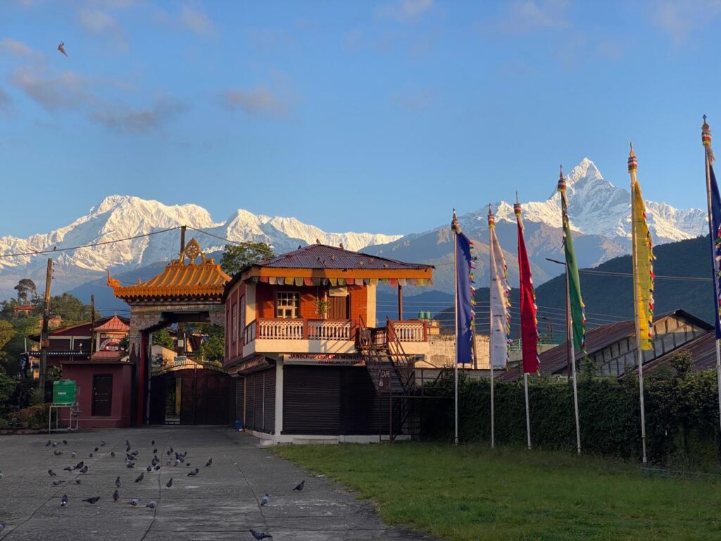 Pokhara Tibetan Cultural Tour — visiting a Tibetan monastery with Himalayan mountain view