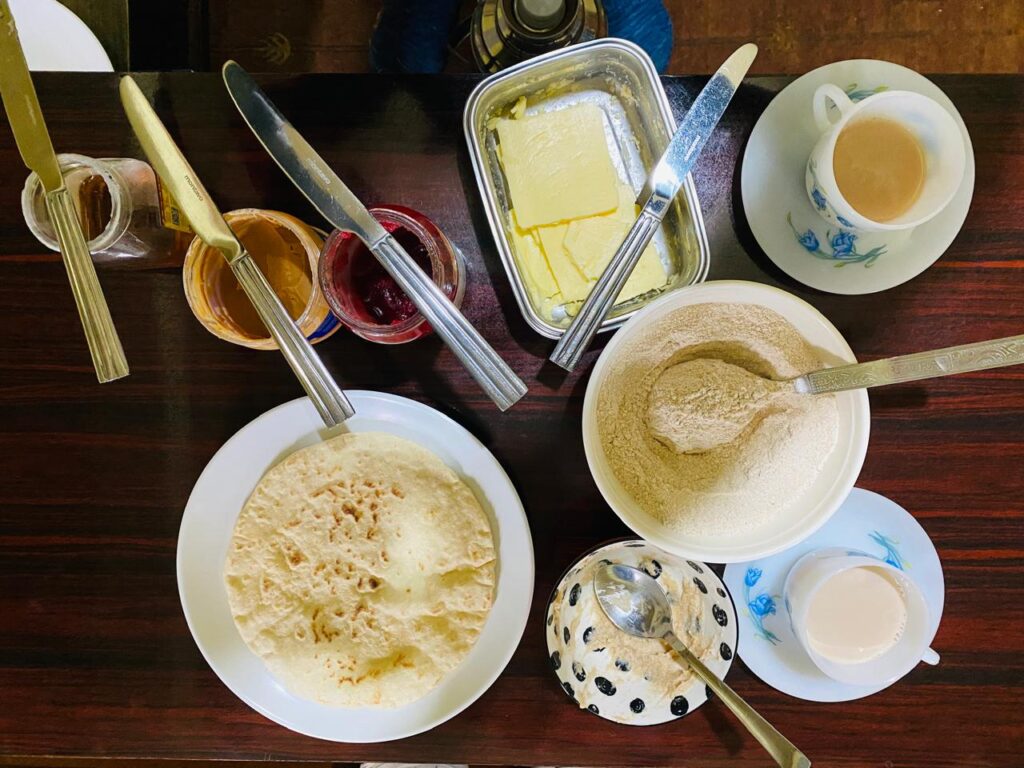 Traditional Tibetan breakfast with tsampa roasted barley, butter tea and handmade Tibetan bread