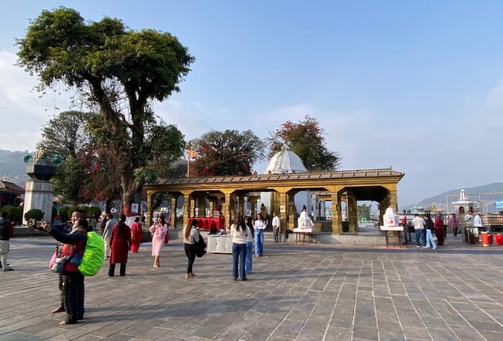 Visitors exploring the courtyard of Bindhyabasini Temple — a peaceful spiritual stop on the Pokhara city tour