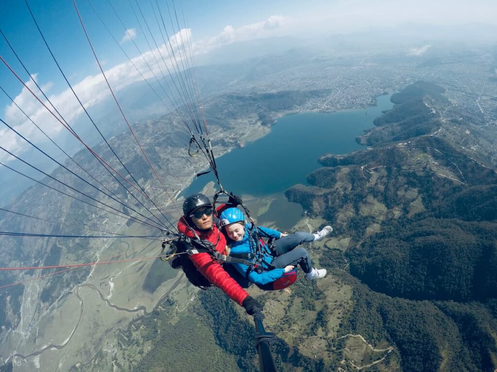 Guided paragliding in Pokhara high above Phewa Lake and the city