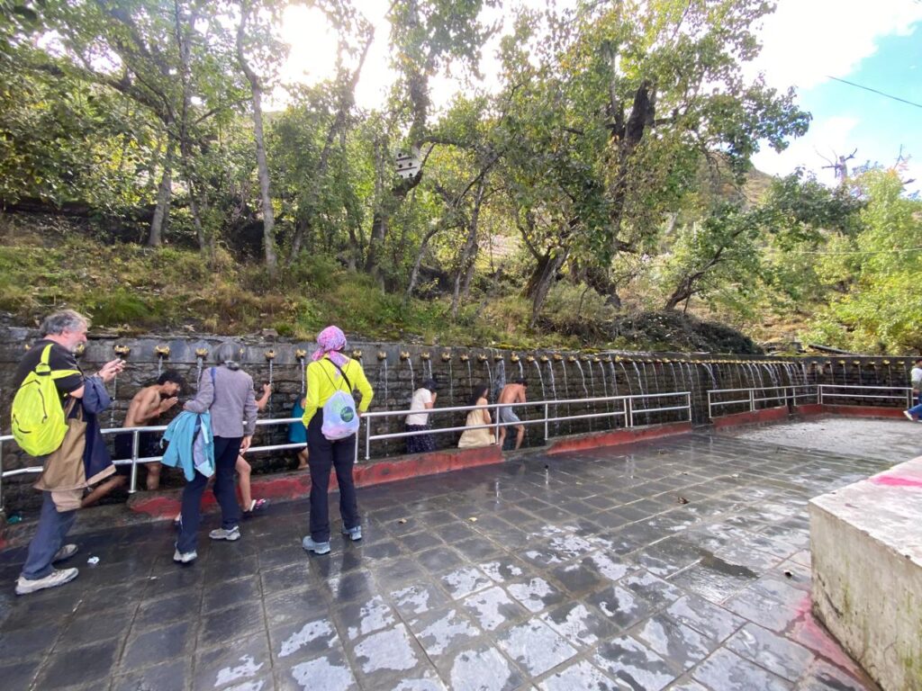 Pilgrims at the 108 holy water taps on the Muktinath Trek 5 Days