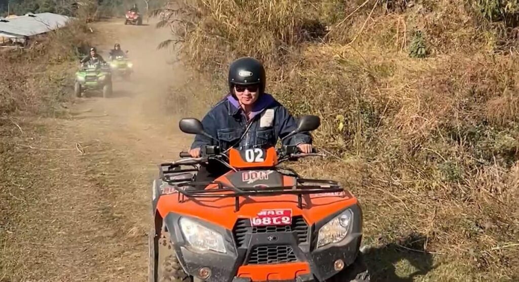 Pokhara adventure activities: off-road convoy on a dusty trail