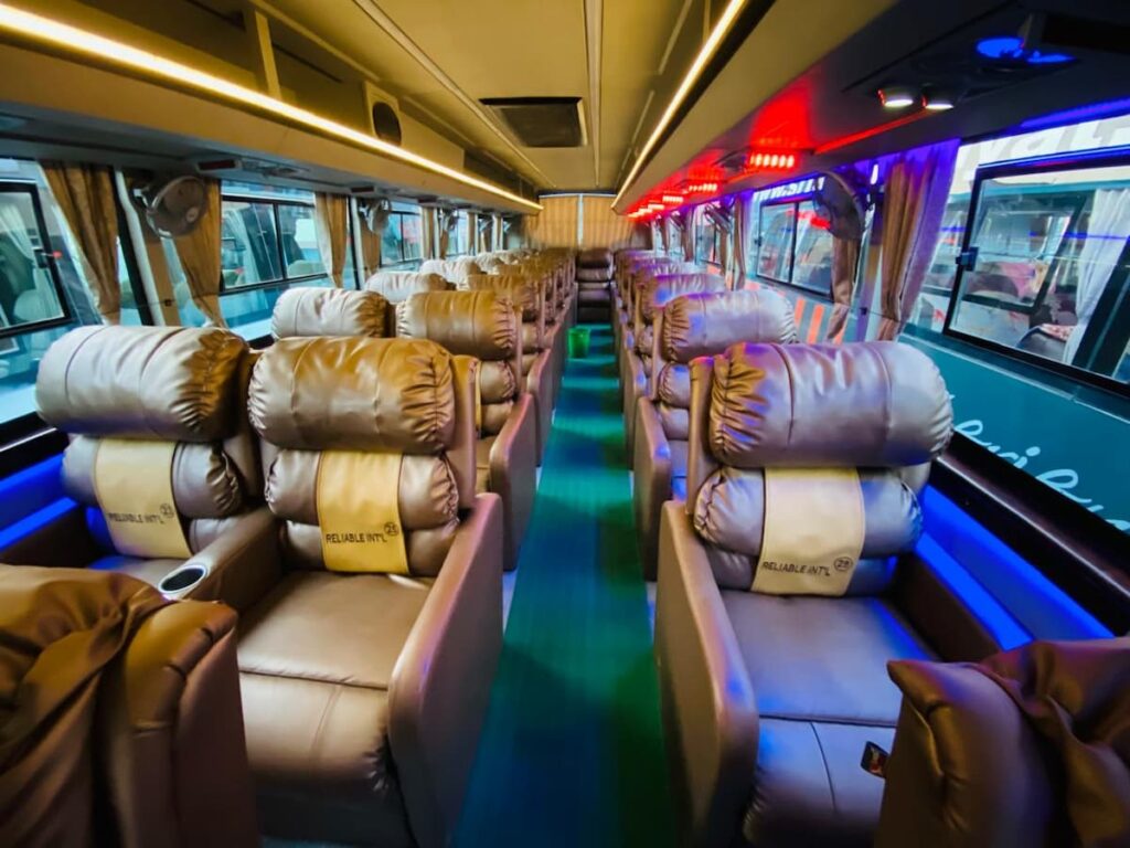 Comfortable sofa bus interior for travel booking in Pokhara