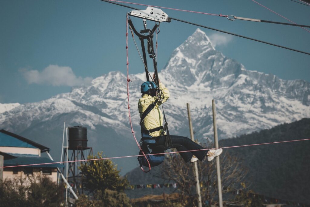 ZipFlyer in Pokhara rider with Machapuchare Fishtail mountain in the background