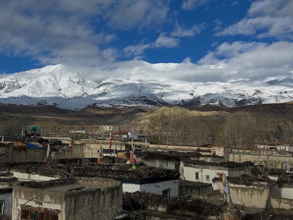 Snow-capped Himalayan peaks above Lo-Manthang, similar to views on the Pokhara to Jomsom Flight